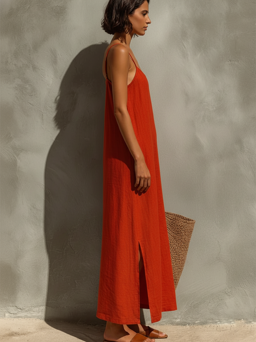 Flowy hem of women's sleeveless square neck spaghetti strap maxi dress, designed for breezy comfort.