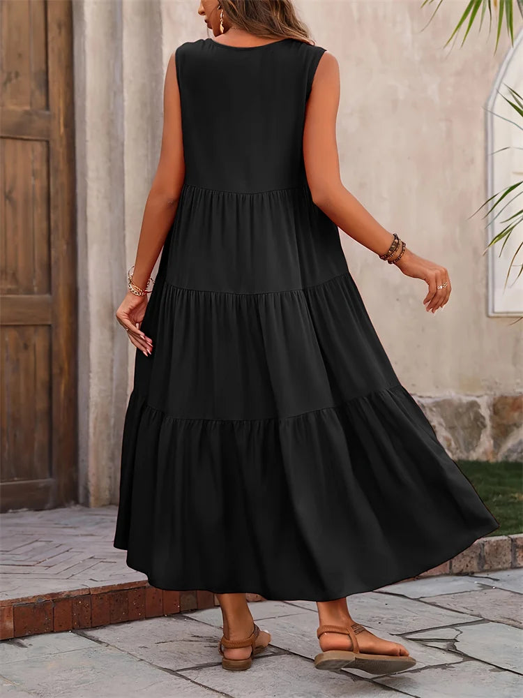 Sunny day essential: women's sleeveless tiered maxi beach dress, perfect for your next vacation.