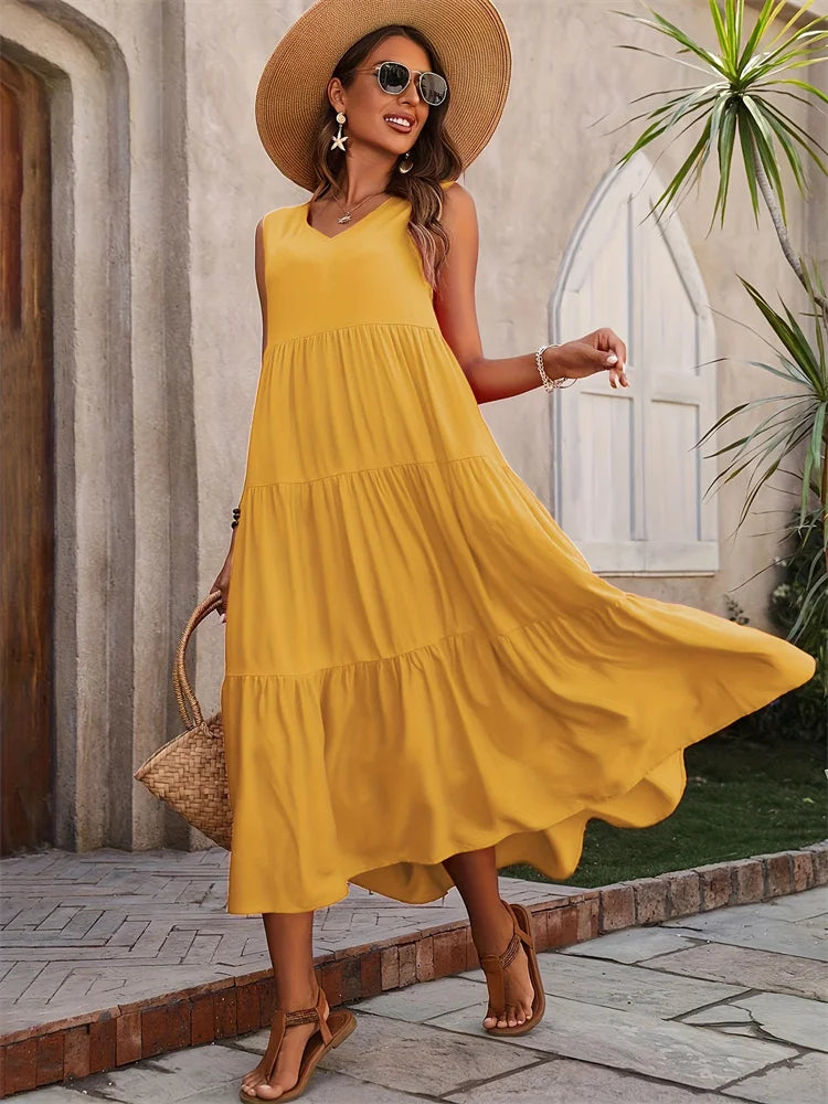 Casual women's sleeveless V-neck tiered maxi summer dress, a flowing and stylish choice for summer.