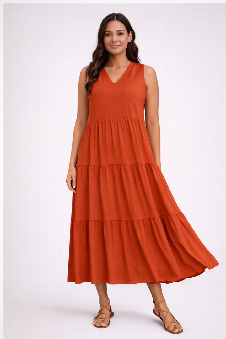 Colorful women's sleeveless tiered maxi summer dress, vibrant for vacation, beach, or everyday casual.