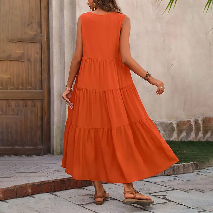 Lightweight women's sleeveless tiered maxi dress, a breezy V-neck option for sunny summer days.