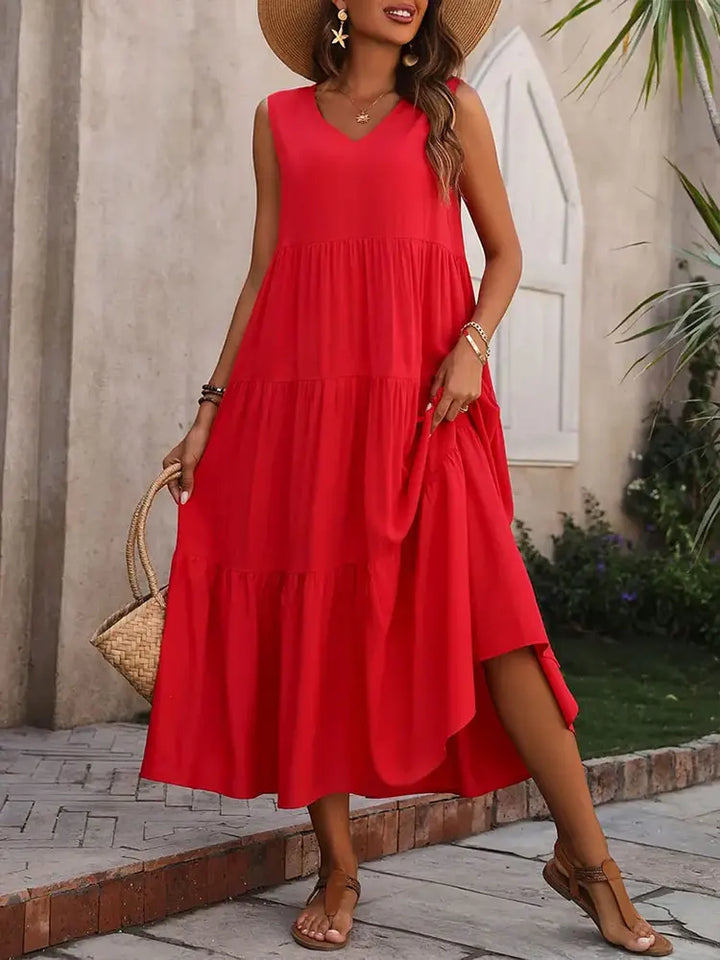 Vibrant women's sleeveless V-neck tiered maxi summer dress, ideal for resort wear and casual fashion.