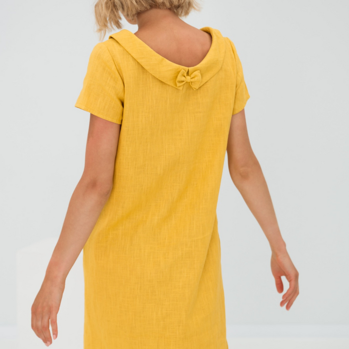 Versatile women's flowy linen sundress, ideal for vacation, resort wear, or daily casual outings.