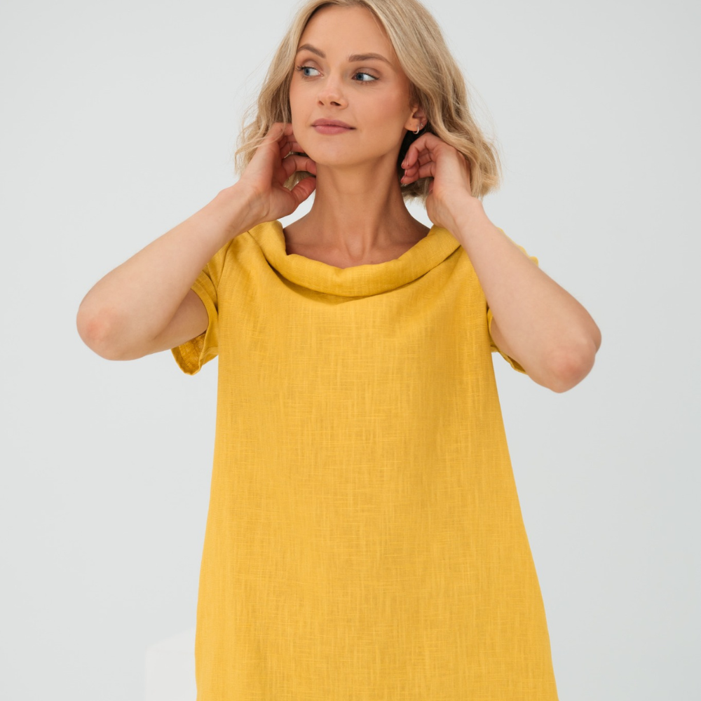Effortless flowy linen summer dress for women, offering a relaxed and chic look.