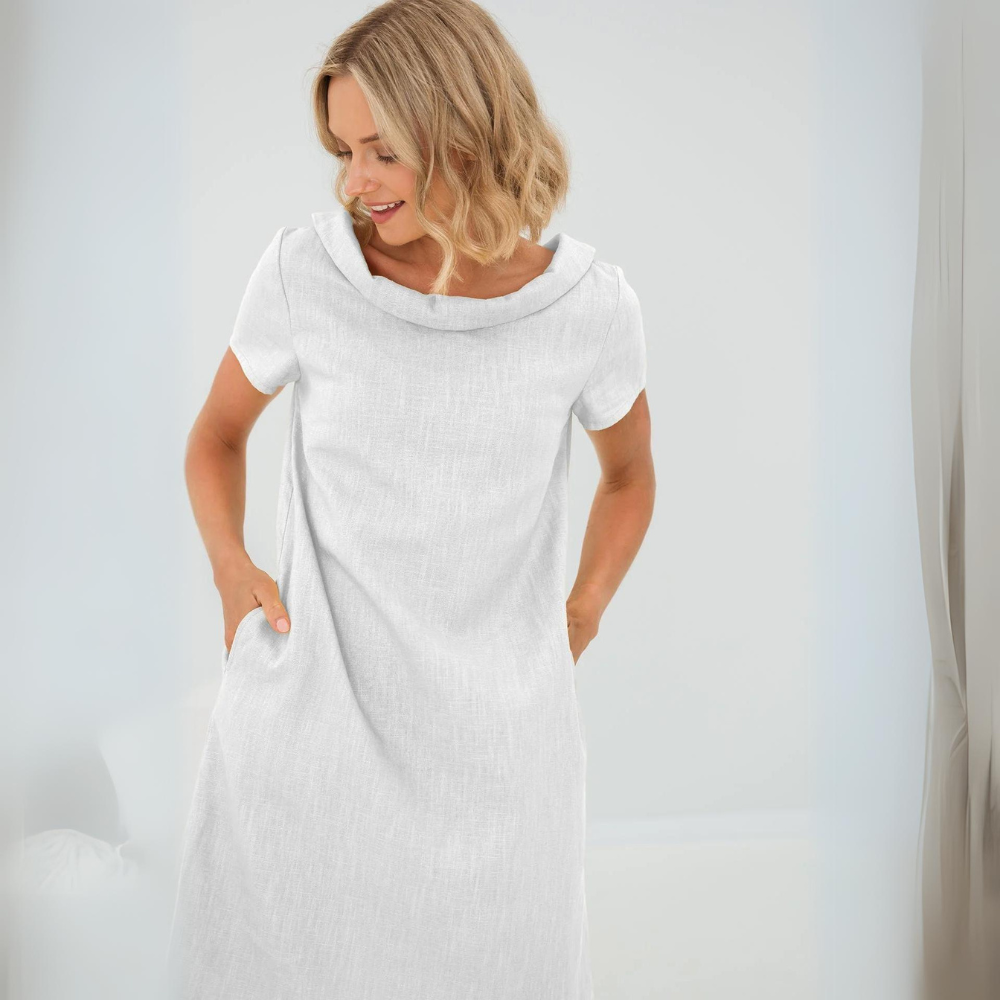 Stylish women's linen resort wear dress, a flowy sundress for elegant vacations.