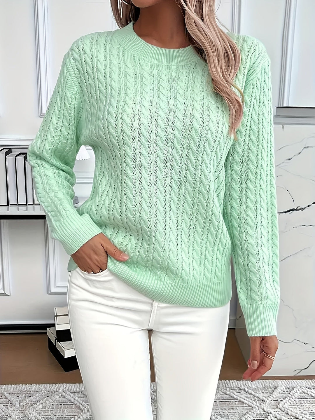 Women's soft cable knit sweater, round neck, long sleeve, perfect for cozy spring and autumn fashion.