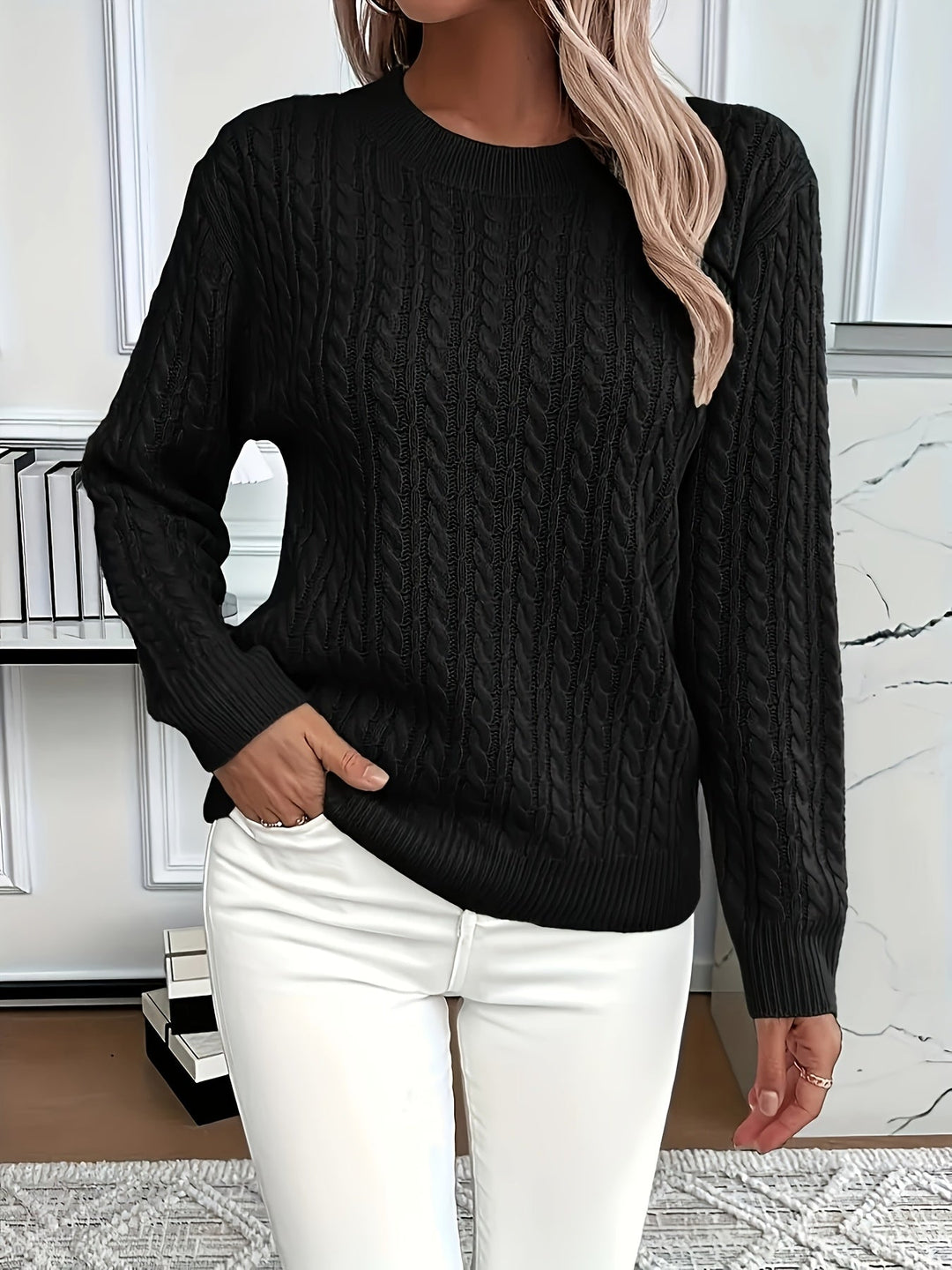 Comfortable women's soft knitted cable sweater, long sleeve and round neck, ideal for cozy spring and autumn wear.