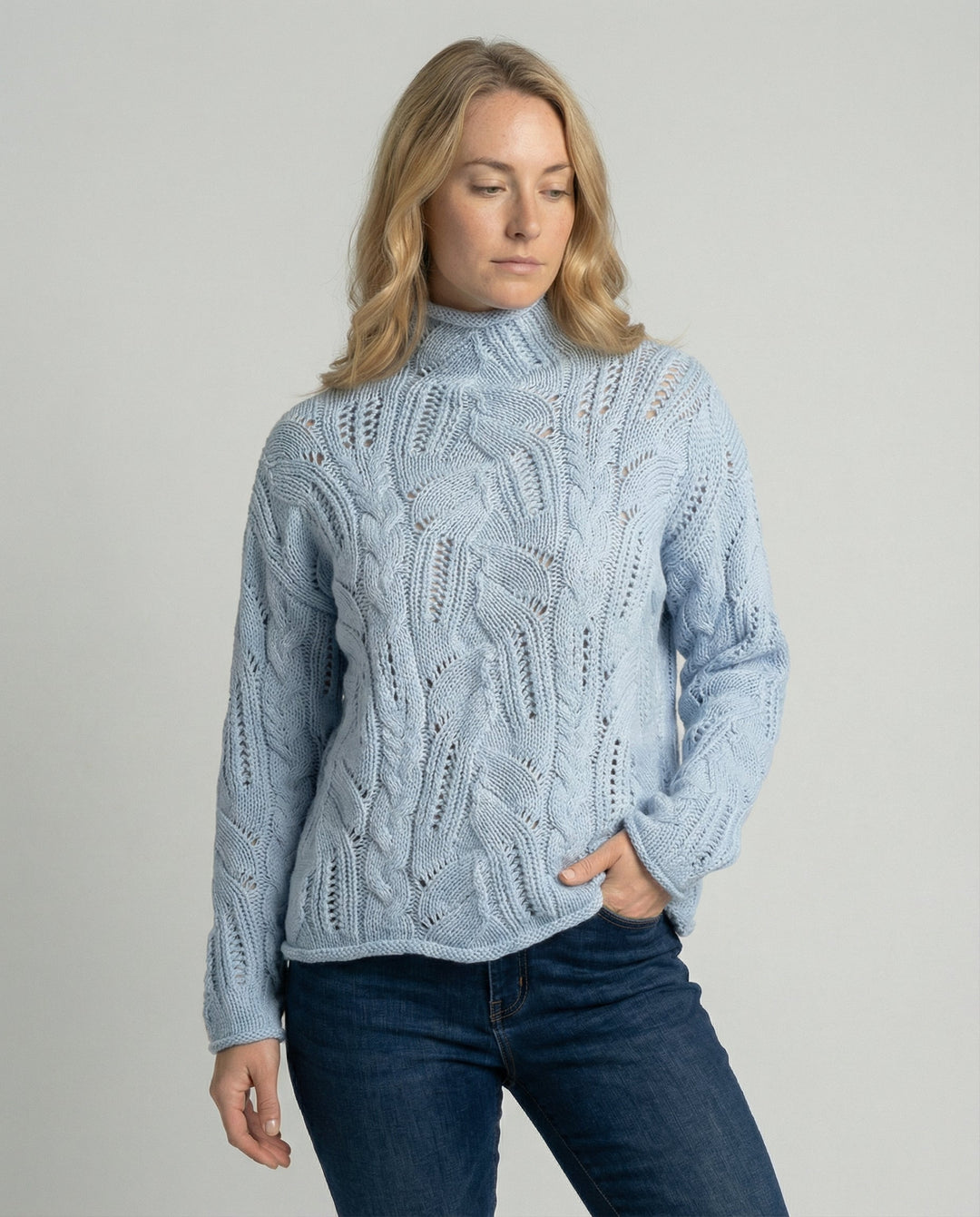 Women's soft & warm minimalist pullover sweater. Elegant knitwear for versatile everyday comfort.
