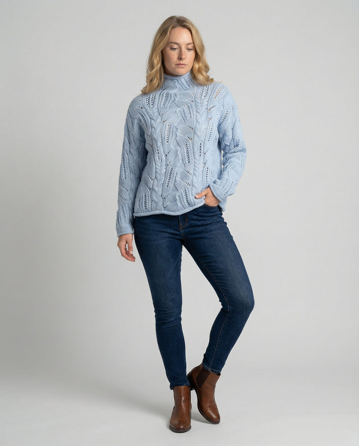 Luxury knit women's soft pullover sweater. Timeless & warm for elegant winter fashion.