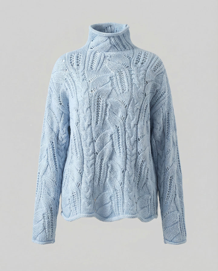 High-quality women's soft knit pullover sweater. Warm & minimalist for versatile winter style.