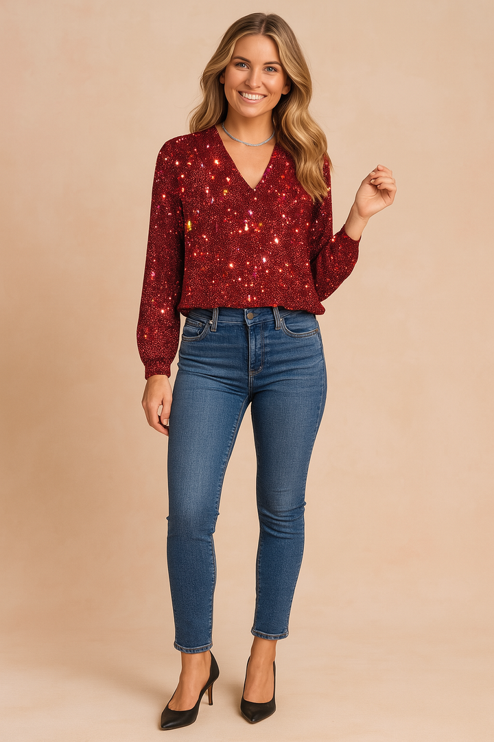 Fashionable women's sparkling sequin V-neck top. Elegant long-sleeve glamour shirt for evening wear.