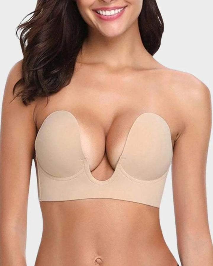 Women's strapless backless push-up plunge bra, self-adhesive for seamless lift & comfort.