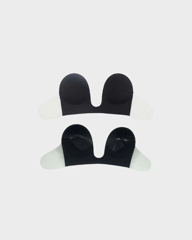 Invisible strapless backless adhesive bra for a seamless look under special occasion outfits. Deep plunge.