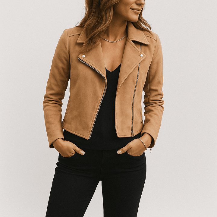 Edgy women's moto jacket, black with silver zips. Stylish zip-up for transitional weather, modern look.