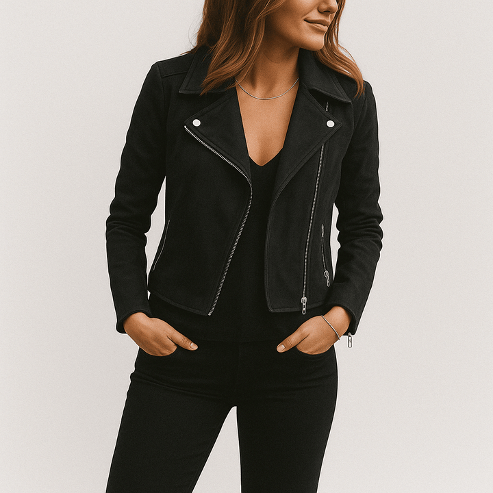 Stylish women's cropped moto jacket. Zip-up detail, perfect for adding an edgy, modern touch to outfits.