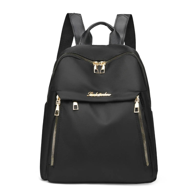 Women's stylish black PU leather travel backpack. Chic, versatile & organized for daily use or school.