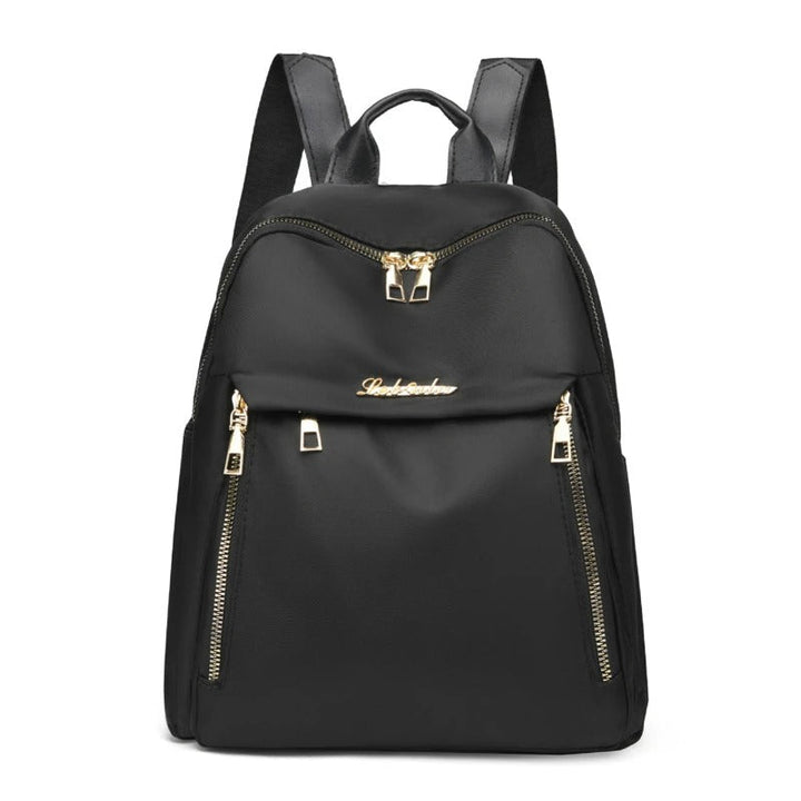 Women's stylish black PU leather travel backpack. Chic, versatile & organized for daily use or school.
