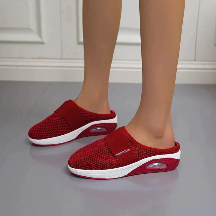 Women's stylish orthopedic slippers with arch support & non-slip soles for daily comfort & pain relief.