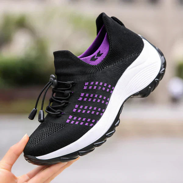 Orthotic insole in women's shoes, engineered for superior arch support & plantar fasciitis pain relief.