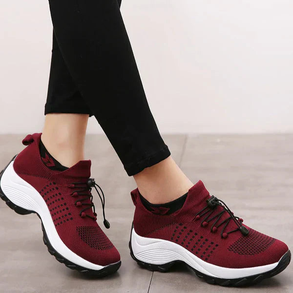 Durable sole of women's orthotic shoes, designed for stability & foot pain relief from plantar fasciitis.