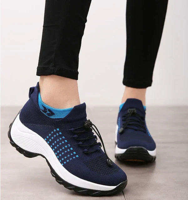 Breathable material of stylish women's orthotic shoes, ideal for plantar fasciitis & everyday comfort.