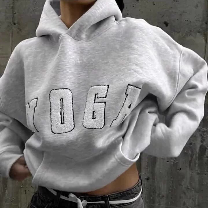 Fashionable women's printed athletic hoodie, versatile for yoga, casual outings, or workout recovery.