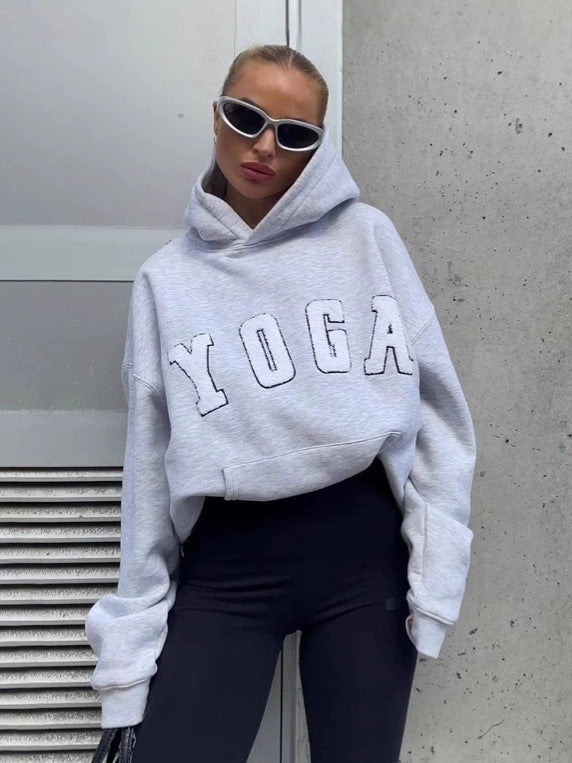 Comfortable women's activewear printed hoodie. Breathable, stylish top for yoga, gym, and daily wear.