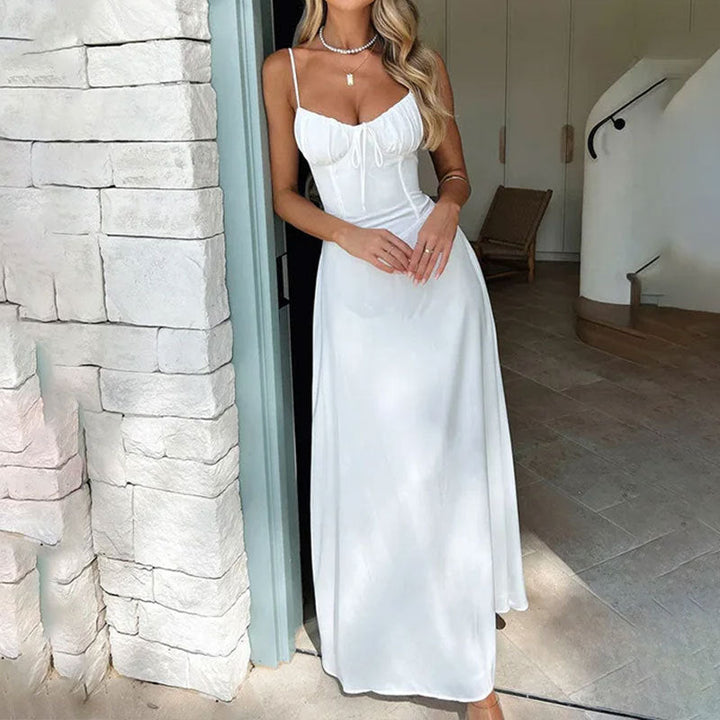 Women's summer sleeveless maxi dress with elegant ruched bodice, perfect for casual wear or holidays.