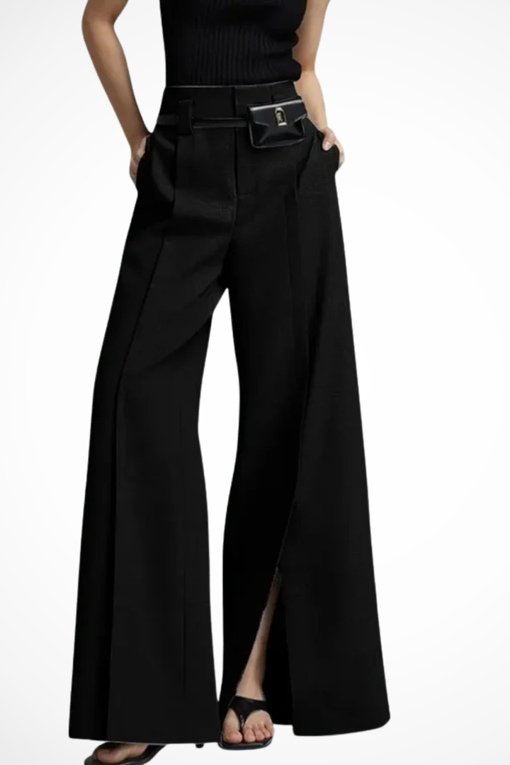 Stylish women's wide leg tailored trousers, high-waisted and belted, offering an elegant silhouette.