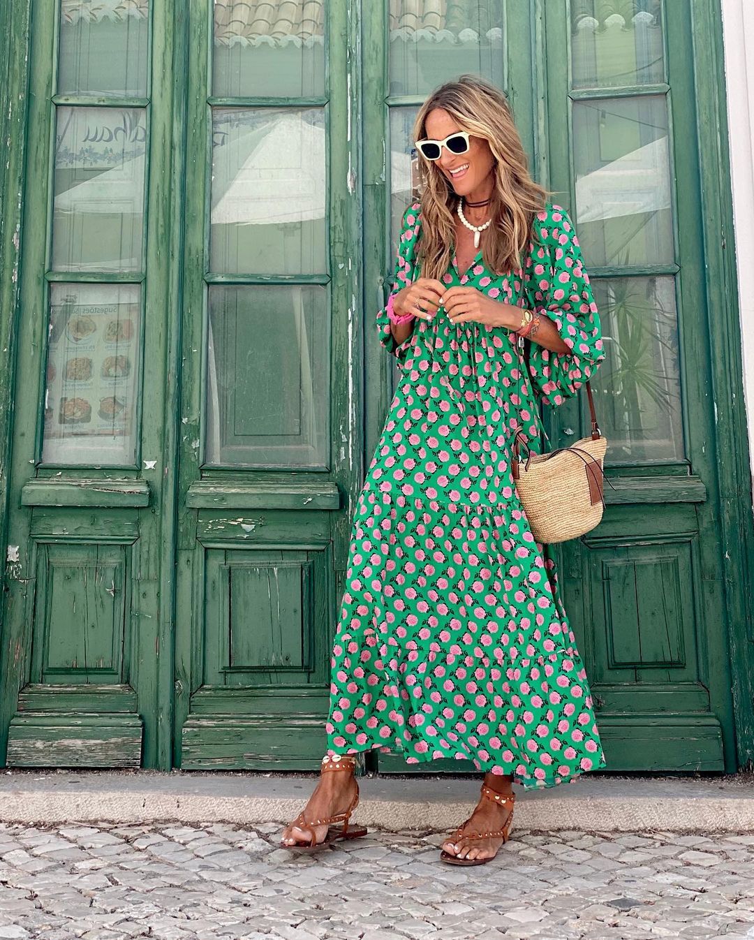 Comfortable women's tiered maxi dress for summer. Features a beautiful floral print & flowy silhouette for any occasion.