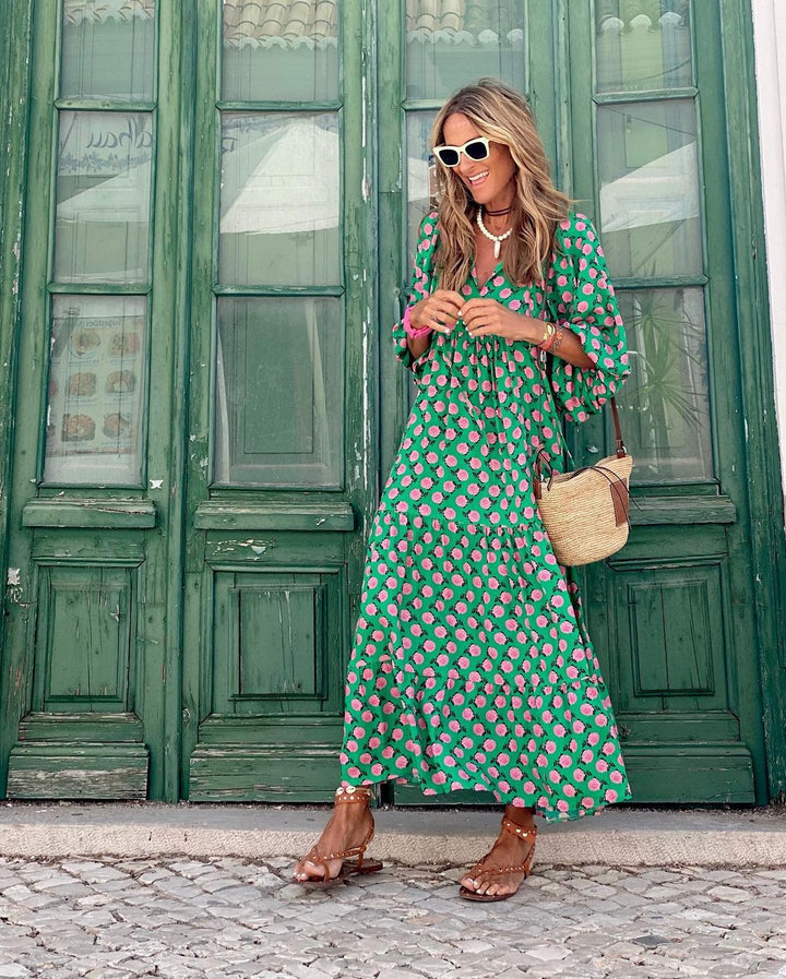 Comfortable women's tiered maxi dress for summer. Features a beautiful floral print & flowy silhouette for any occasion.