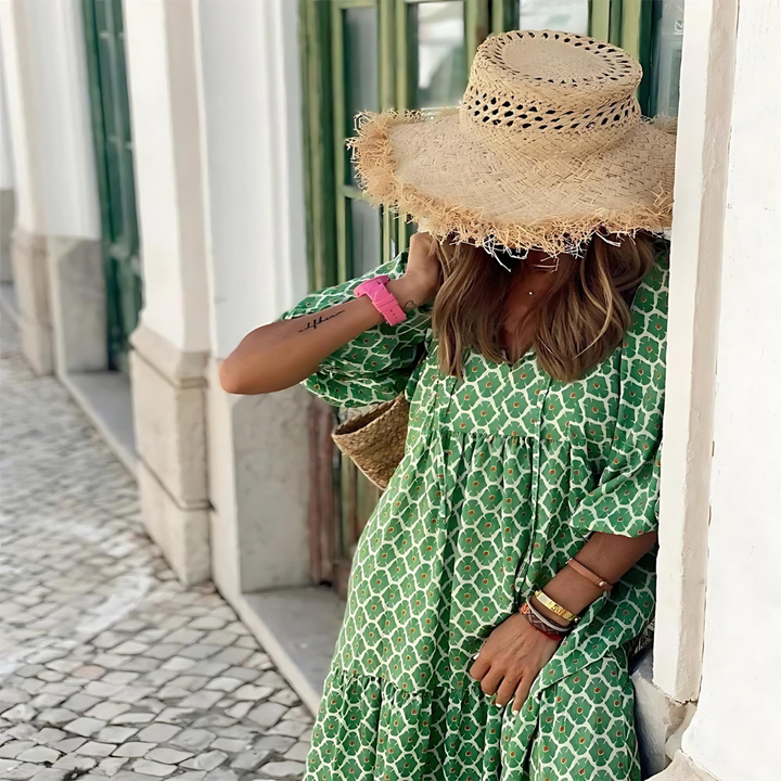 Floral women's tiered maxi dress with comfortable balloon sleeves, perfect for casual summer outings or elegant events.