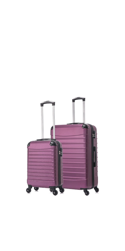 Women's two-piece purple hard-shell luggage set with smooth spinner wheels for effortless travel.
