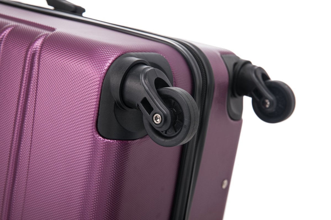 Purple hard-shell luggage set, 2-piece for women, designed for seamless travel experiences.