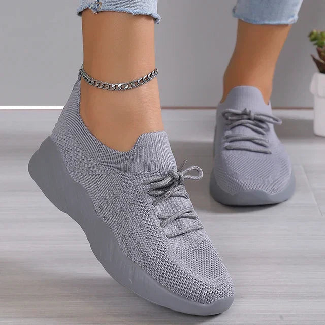 Stylish women's slip-on casual sneakers, perfect for athleisure and comfortable everyday footwear.