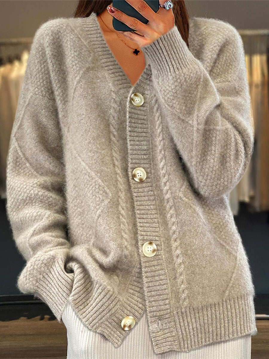 Cozy women's cable knit cardigan sweater with a stylish V-neck & button front. Soft long sleeve for winter comfort.