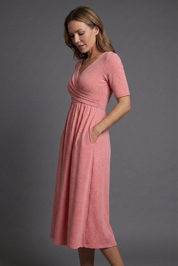 Elegant short sleeve V-neck wrap dress for women. A comfortable and versatile midi dress with pockets.