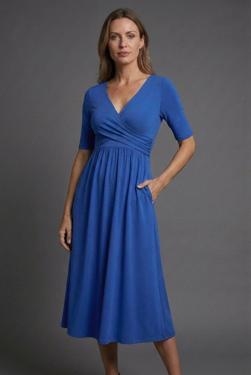 Versatile women's midi dress with V-neck, wrap front, and pockets. Great as a party, casual or summer dress.