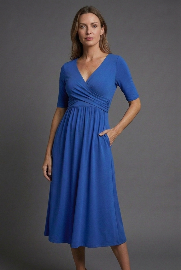 Versatile women's midi dress with V-neck, wrap front, and pockets. Great as a party, casual or summer dress.