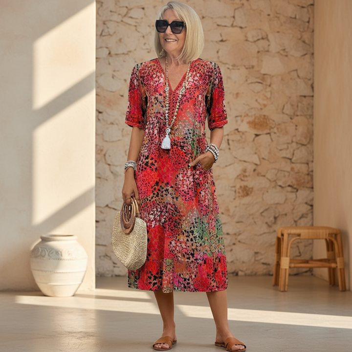 Women's vibrant pattern midi dress, flowing, elegant, perfect for summer occasions.