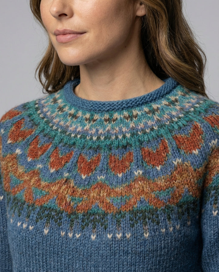 Elegant women's Nordic design sweater, warm vintage Icelandic pullover for cozy winter fashion.
