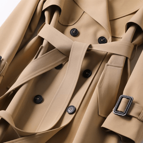 Trendy women's vintage trench coat, a sophisticated long outerwear jacket for timeless fall and spring fashion.
