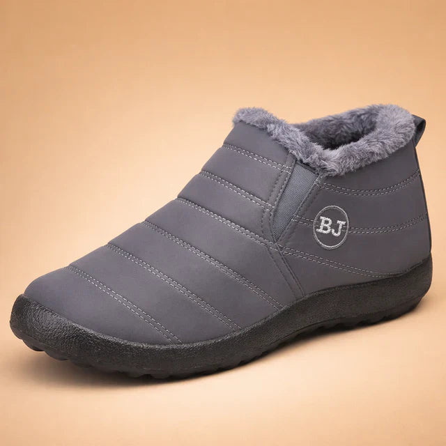 Durable waterproof women's snow boots, warm and anti-slip for cold weather outdoor activities.