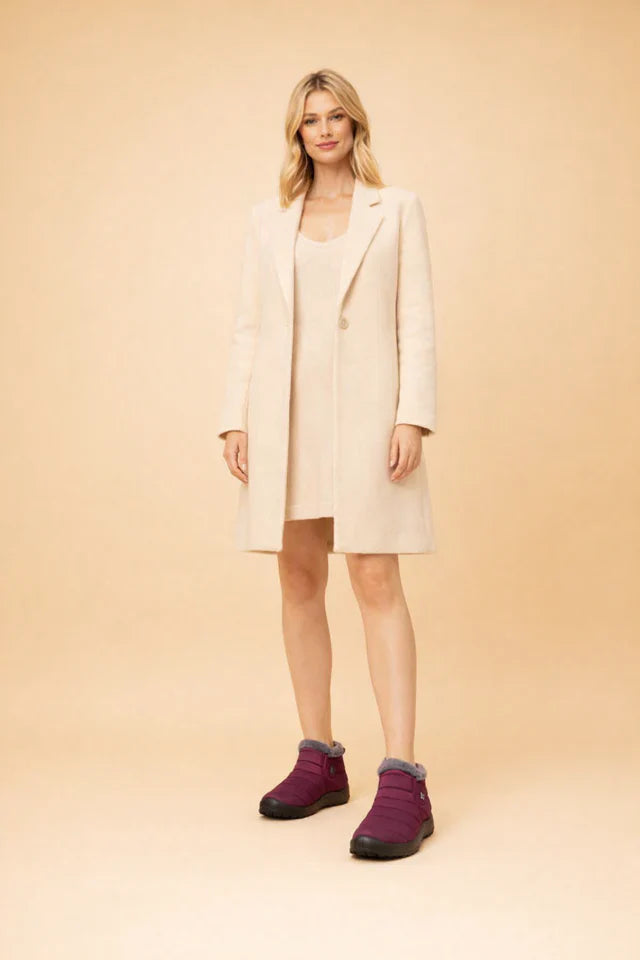 Warm women's winter boots, anti-slip & waterproof for secure footing in snow & cold conditions.