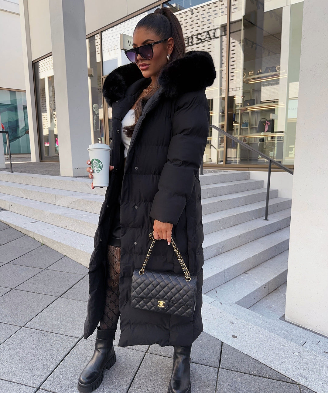Women's warm belted puffer winter coat. Stylish maxi length for ultimate cold weather protection.
