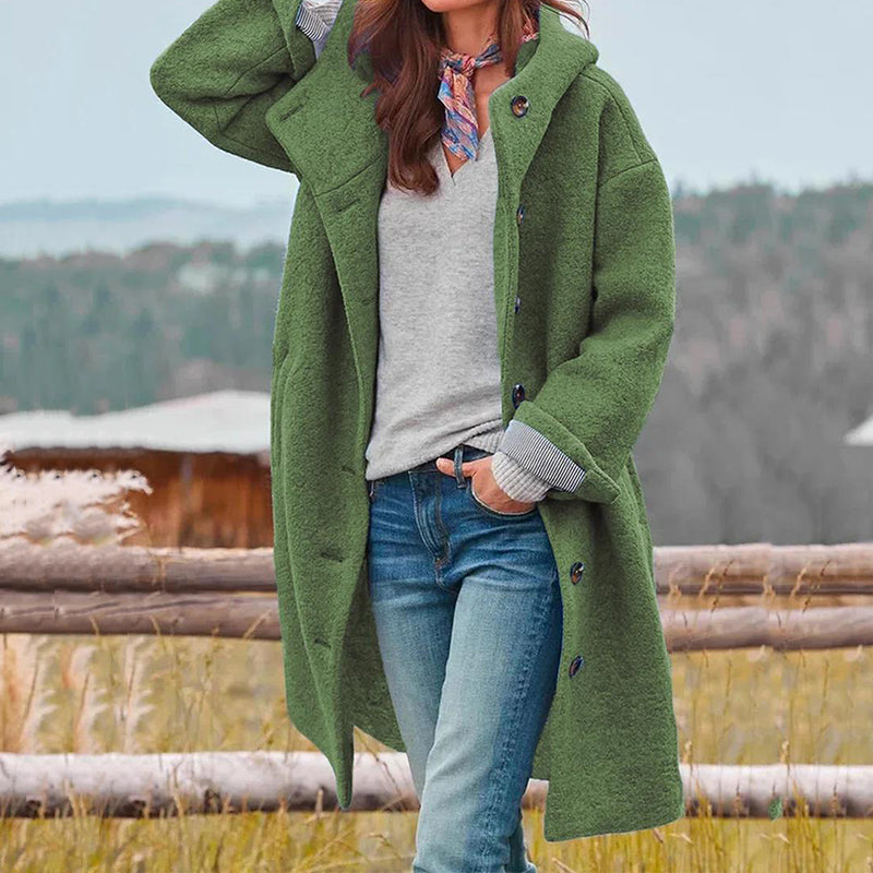 Women's warm hooded winter coat, perfect for cozy comfort in cold weather. Elegant & stylish outerwear with a relaxed fit.