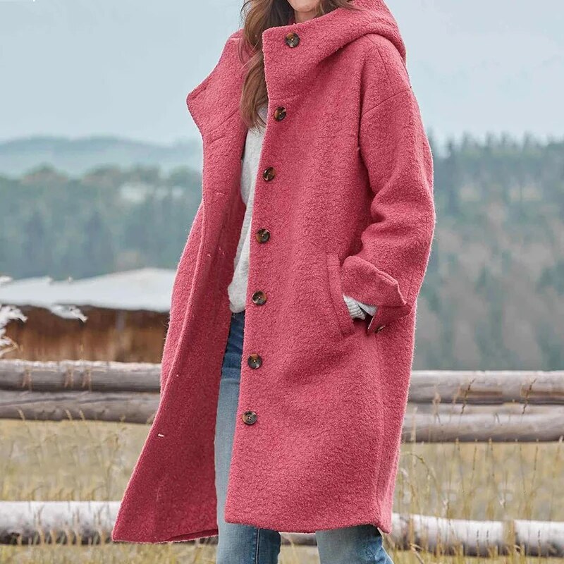 Relaxed fit women's warm hooded winter coat. Elegant & cozy outerwear, ideal for stylish winter fashion and comfort.