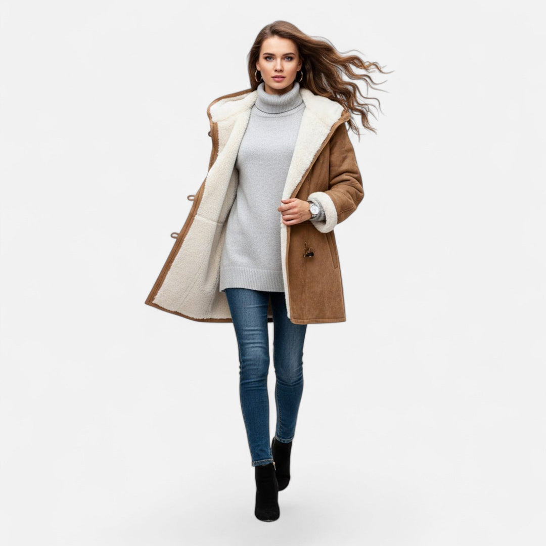 Versatile women's warm coat. Hooded, button-front, suitable for both elegant and casual winter looks.