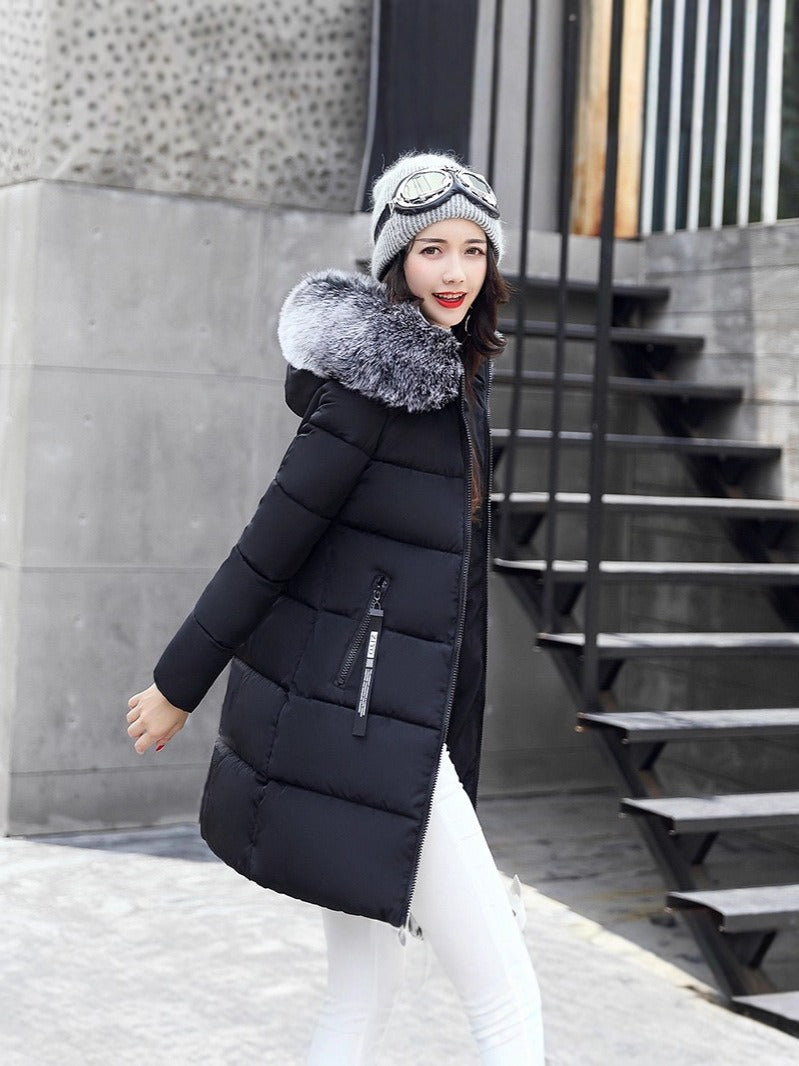 Stylish women's hooded long parka, perfect for all-weather travel and everyday outerwear in cold winter conditions.