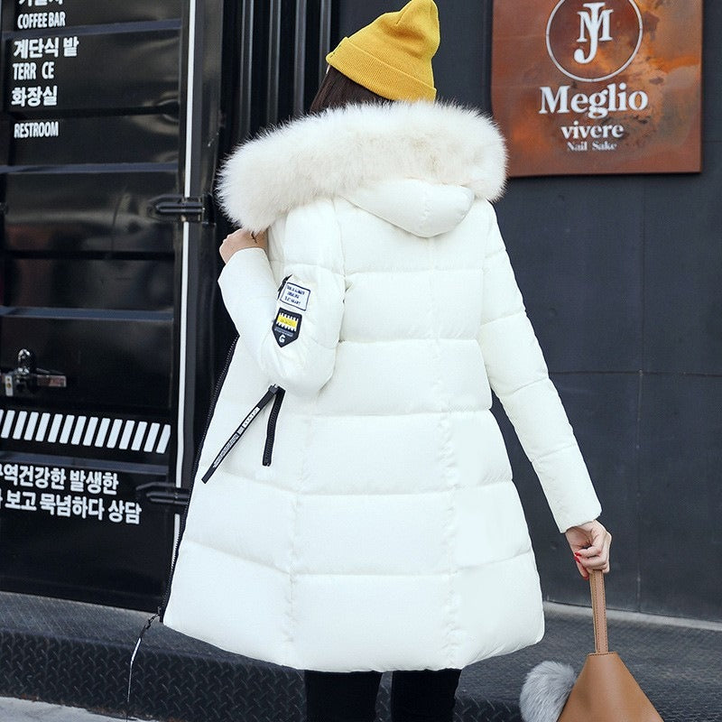 Comfortable & stylish women's long hooded winter jacket, ideal for cold weather outerwear & everyday protection.